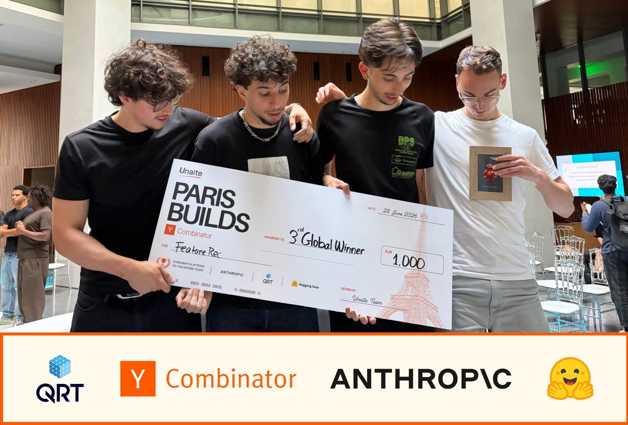 Our team holding the Paris Builds 3rd Global Winner check for Feature-Rec